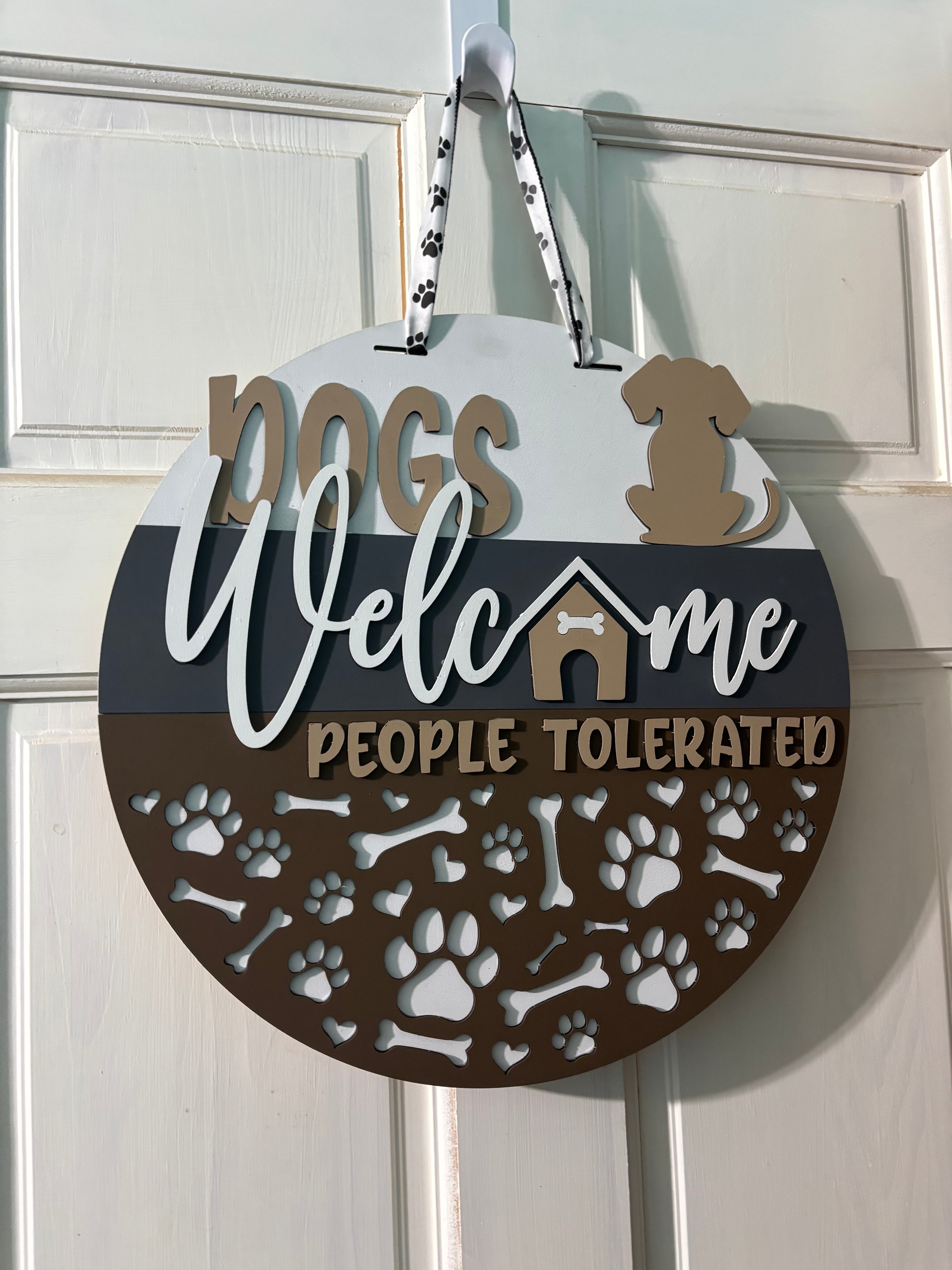 Door Hanger Dogs Welcome People Tolerated in light and dark browns 16 inch
