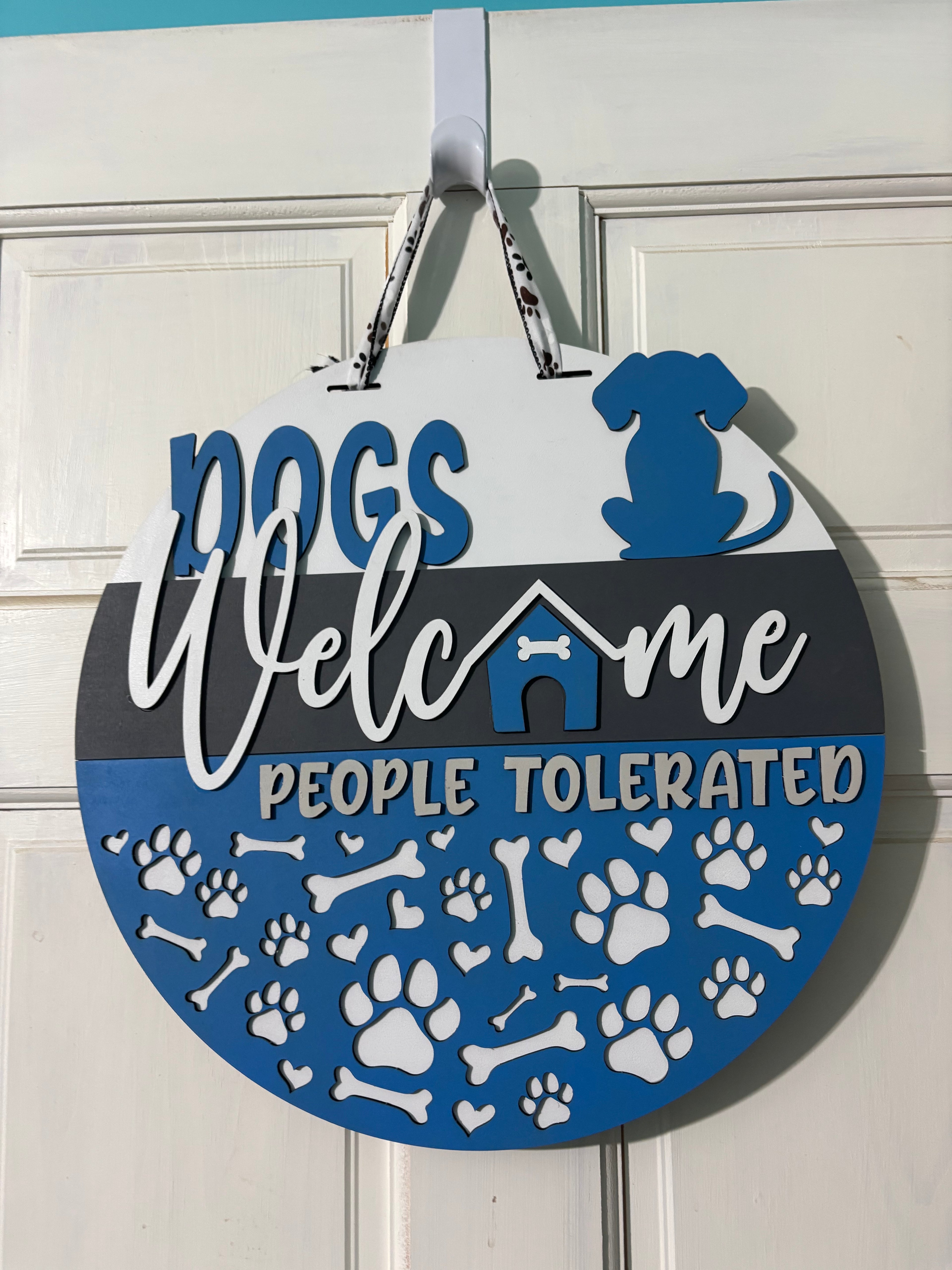 Door Hanger Dogs Welcome People Tolerated in dark blues 16 inch