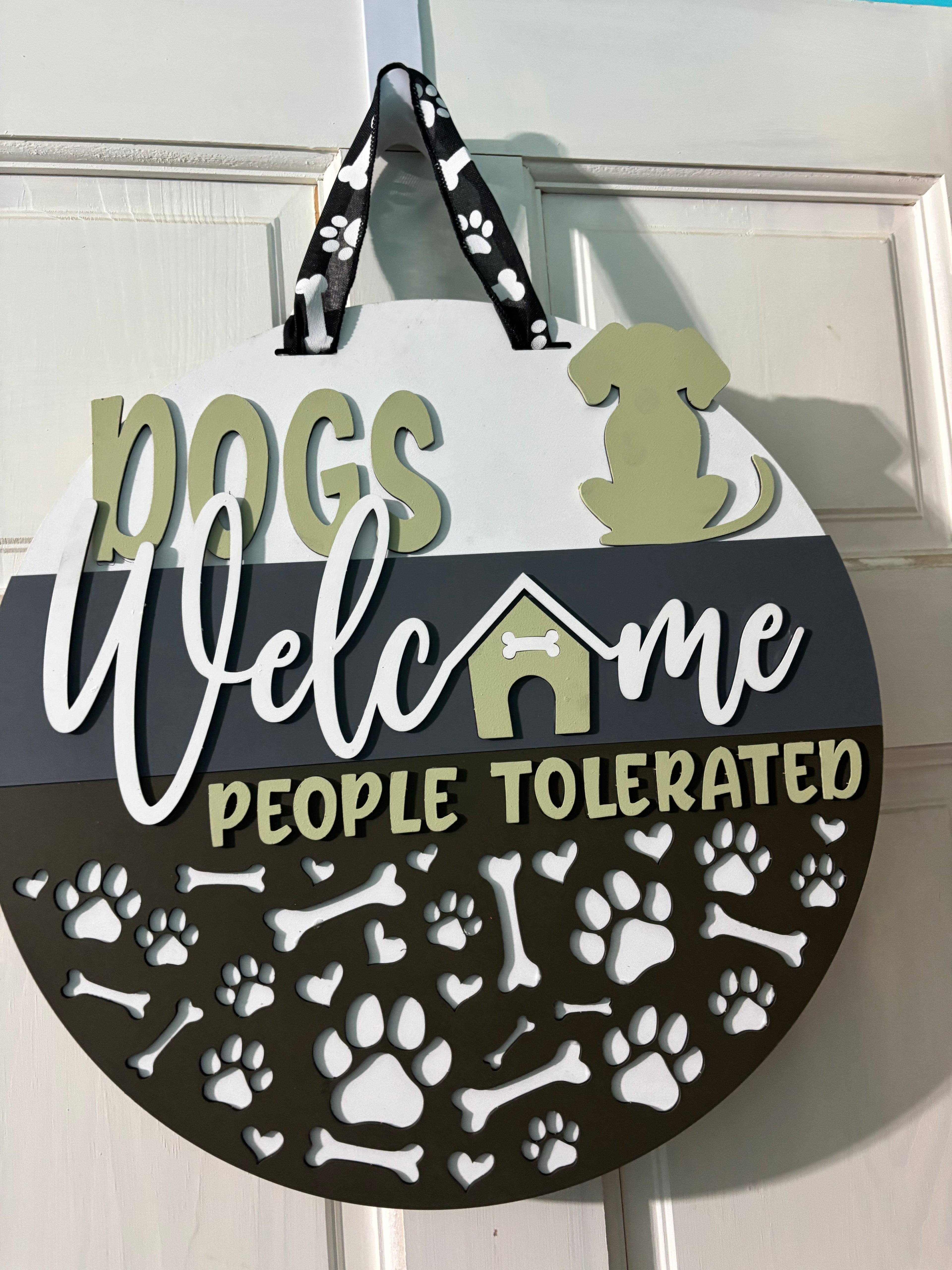 Door Hanger Dogs Welcome People Tolerated in light and dark greens 16 inch