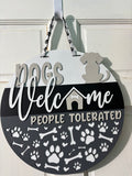 Door Hanger Dogs Welcome People Tolerated in light and dark greys 16 inch