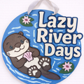 Door Hanger Lazy River Days with Otter with blue background 10 inch