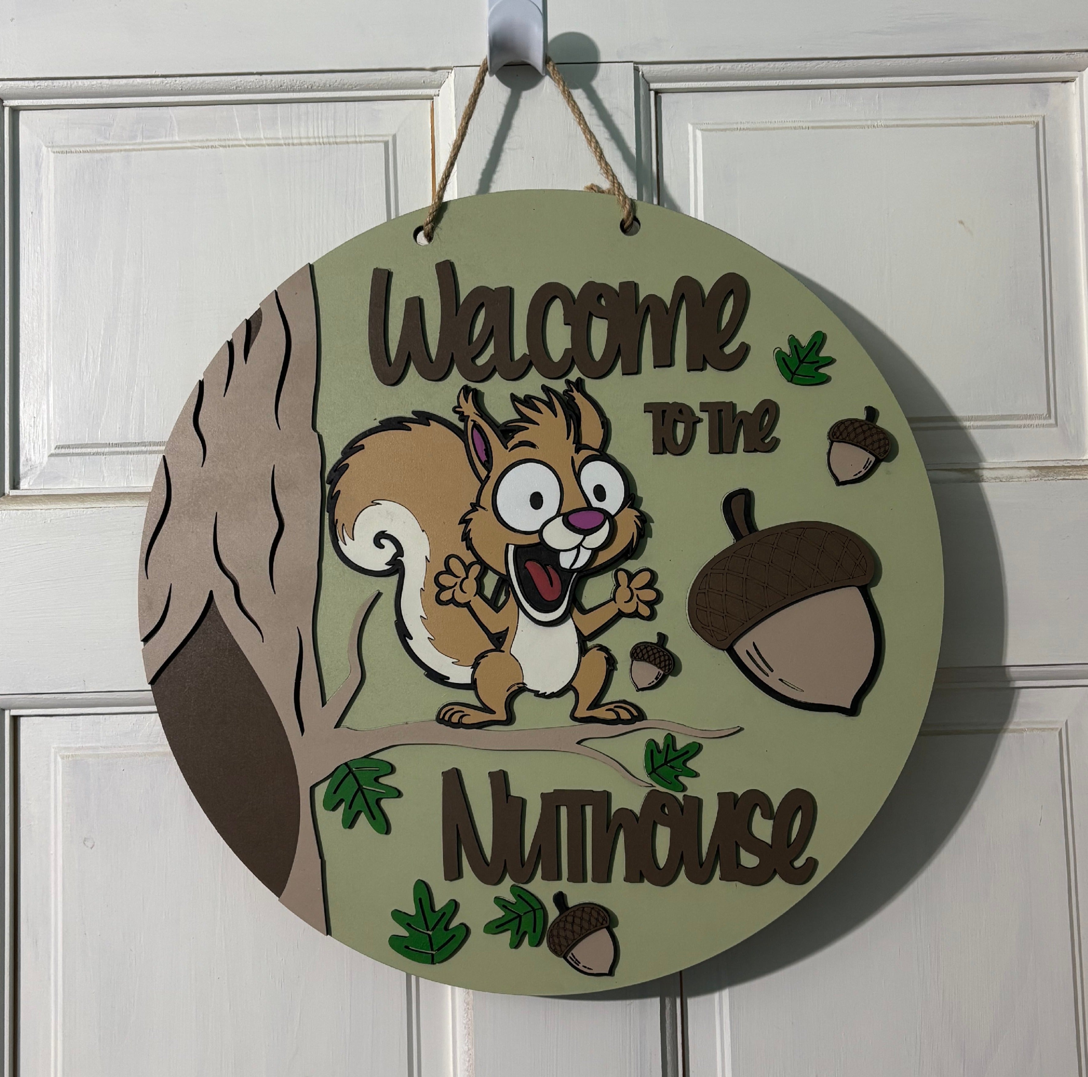 Door Hanger Welcome To The Nuthouse 10 inch