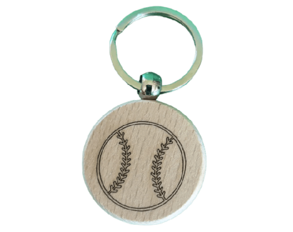 A baseball keychain with the image of a ball on it.