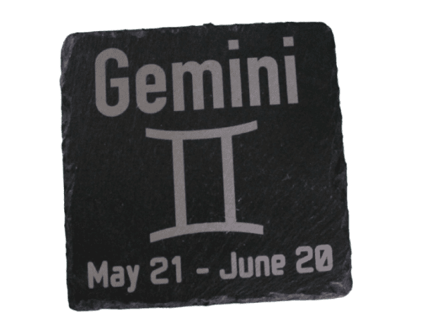 A stone with the words gemini on it.