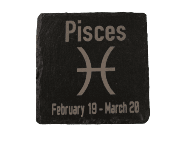 A square stone with the zodiac sign pisces written on it.