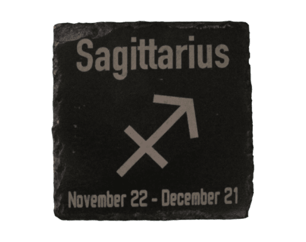 A black and white sagittarius sign on a green background