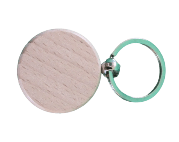 A green ring and a wooden disc on a green background