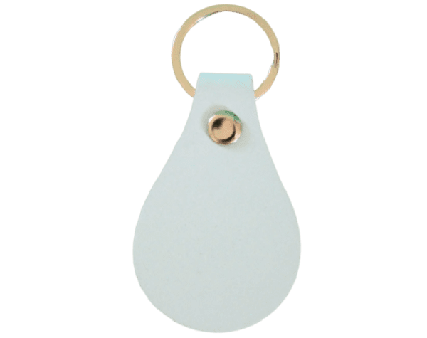 A white leather key chain with a gold ring.