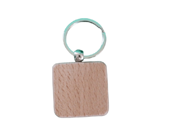 A square shaped keychain with a green ring.