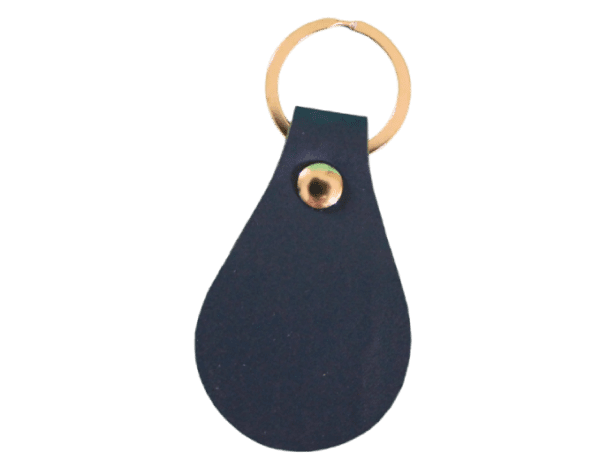 A blue leather key chain with an eye on it.