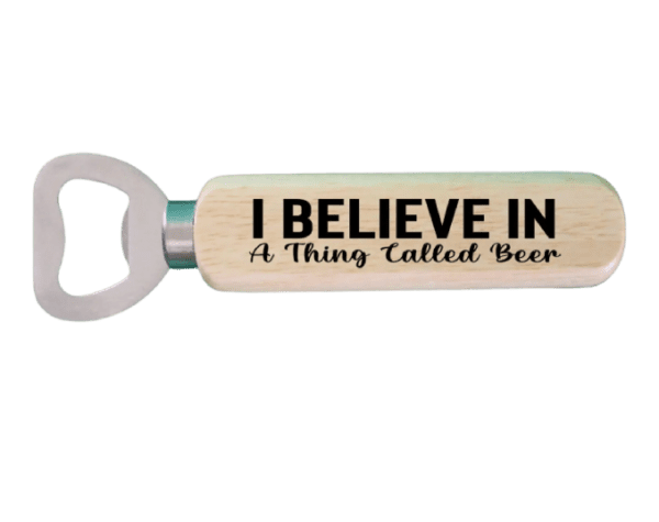 A wooden bottle opener with the words " i believe in a thing called beer ".