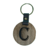 A wooden key chain with the letter c on it.