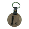 A wooden key chain with the letter l on it.