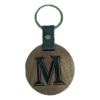 A wooden key chain with the letter m on it.
