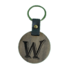 A wooden key chain with the letter w carved into it.